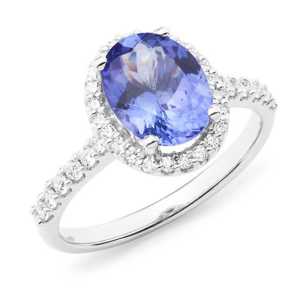 Oval Tanzanite & diamond halo ring