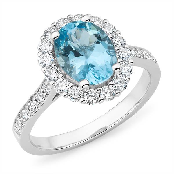Oval aquamarine with diamond shoulders ring